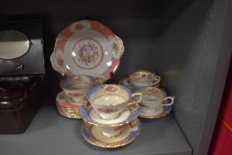 A selection of fine tea wares including Paragon teacups, and Royal Albert Lady Carlyle cake plates.