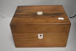 An Edwardian bachelors vanity travel case having fitted interior with secret drawer and mahogany
