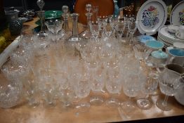 A large quantity of early 20th century clear cut crystal glass wares including Brandy, Wine,