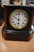 A Victorian French slate and red marble insert mantel clock with eight day movement