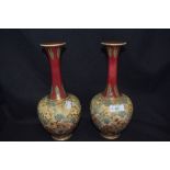 A pair of early 20th century Royal Doulton vases having textured lace effect finish to body,