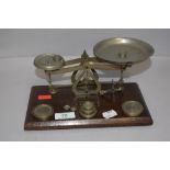 A set of vintage Ensign postal scales with accompanying weight set