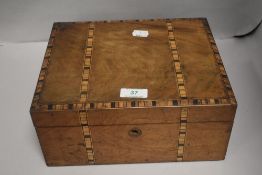 An early 20th century writers case or slope having mahogany case with inlayed veneer banding and