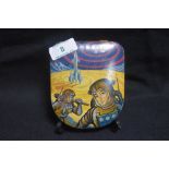 An early 20th century confectionary tin with lithograph print of Atomic space men