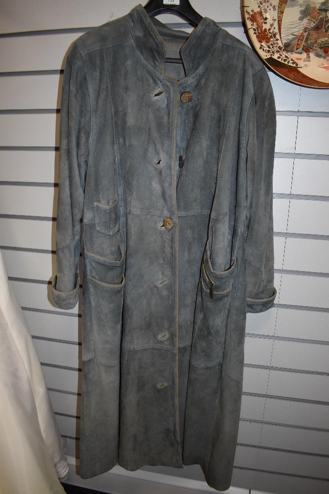 A vintage ladies suede long length jacket.