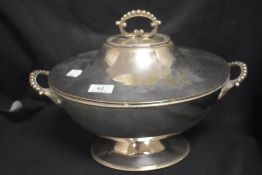 An early 20th century Mappin and Webb silver plated lidded soup tureen of typical design with