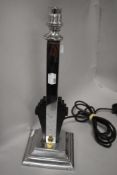 An early 20th century Art Deco table or side lamp in chrome