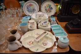 A selection of mid century Poole pottery dinner and tea wares