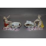 Two early 19th century Meissen marked porcelain salt cellars with Putti style figures and