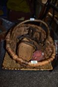 Three fibre woven baskets including a small trug and larger flower trug