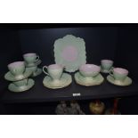 An Art Deco era Foley tea service no.2054 in green and pink colour way.