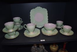 An Art Deco era Foley tea service no.2054 in green and pink colour way.