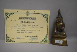 An 18th century Bronze seated Burmese Buddha statue in a typical meditating pose, 17cm tall by 8cm