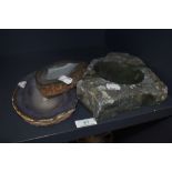 Two semi precious stone geode trays polished and carved and a similar green stone dish