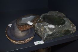 Two semi precious stone geode trays polished and carved and a similar green stone dish