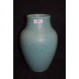 An Arts and Crafts era Pilkingtons Royal Lancastrian studio pottery vase in a green mottle glaze no.