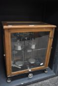 A set of cased chemist or apothecary scales of scientific interest