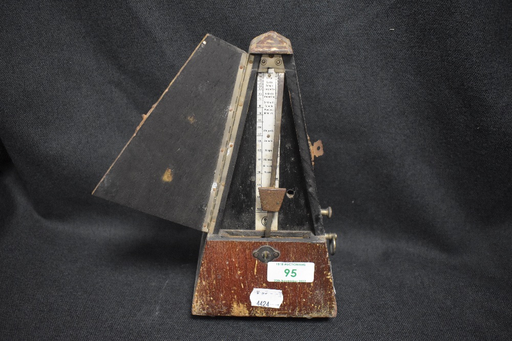 An early 20th century System Maezel Metronome in wooden case.