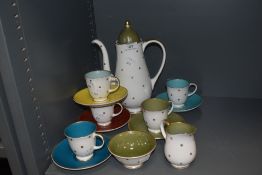 A modern Susie Cooper star pattern harlequin part tea set for five.