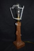 A Robert Mouseman Thompson, Kilburn, Arts and Crafts oak table or side lamp 26cm tall bearing