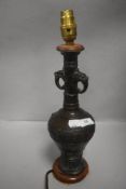 A modern reproduction cast Chinese bronze lamp base