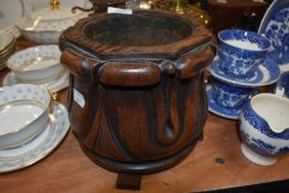 A Victorian elephant foot style wooden planter