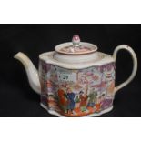 A Lowestoft porcelain teapot in commode shape with Chinoiserie pattern having had professional
