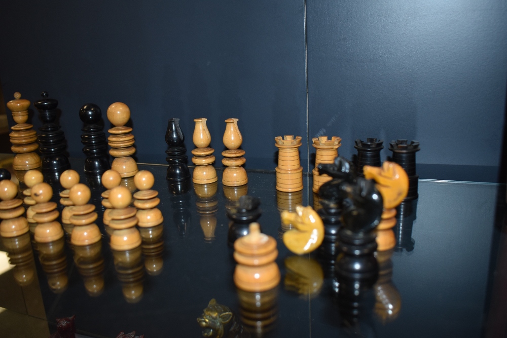 A fine part chess set in box wood and ebony some pieces being damaged and repaired. - Image 4 of 5
