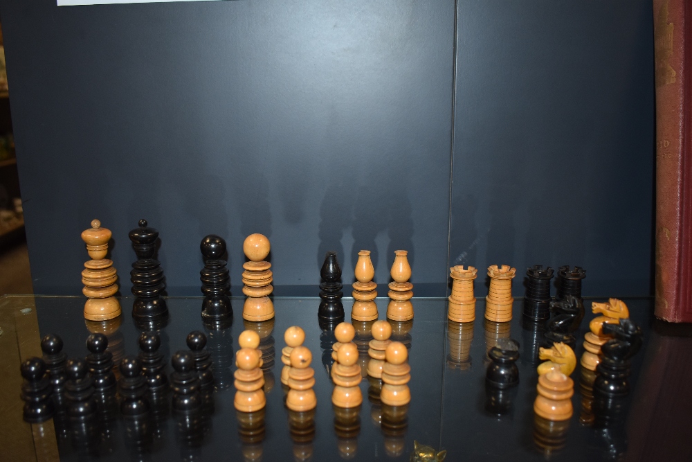 A fine part chess set in box wood and ebony some pieces being damaged and repaired. - Image 2 of 5