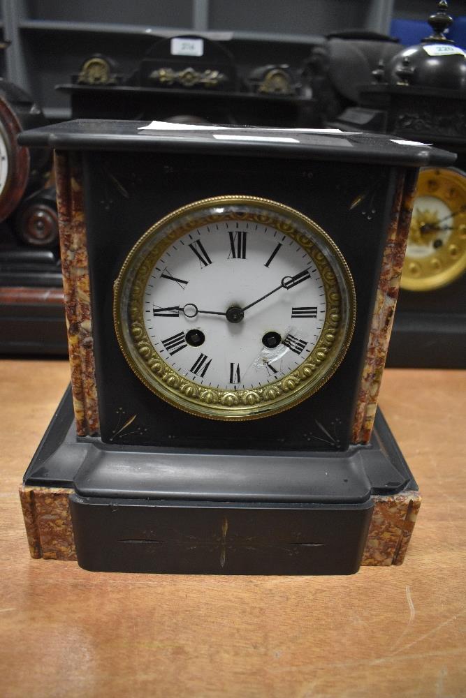 A Victorian French marble striking mantel clock Japy Freres with a German movement. Dial having