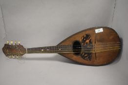 A Francesco Salomone Napoli vintage bowl back mandolin. Bearing paper makers label.