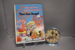 A mid century Magic Roundabout alarm clock and a There Goes Dougal story book