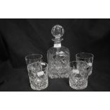 A modern Thomas Webb set of four tumblers with matching decanter.