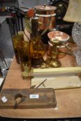 A selection of vintage hardware including brass candle sticks, copper pans with ceramic lining and a