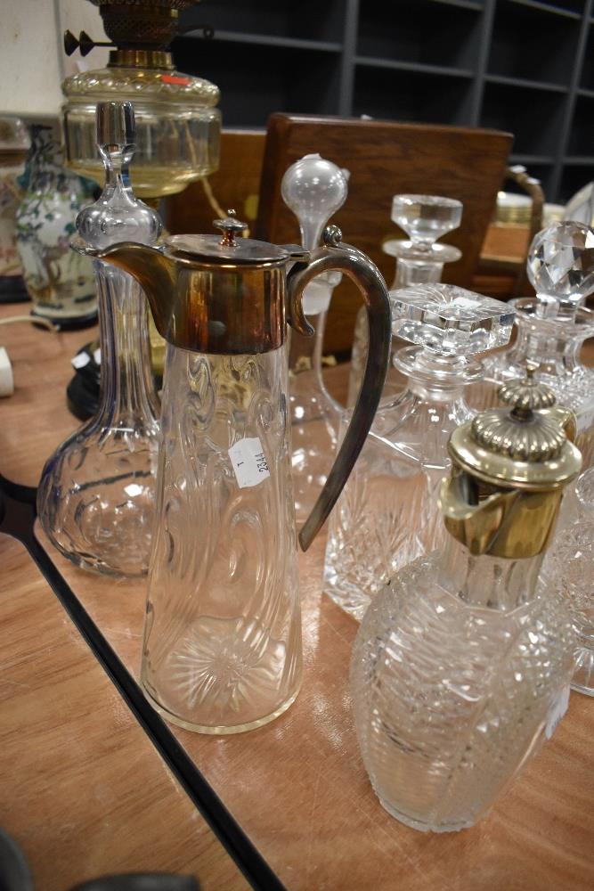 A fine selection of early 20th century clear cut glass decanters, and two claret jugs - Image 2 of 2
