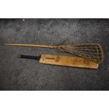 A 20th century La Crosse racket and a Gray Nicolls Steel Spring cricket bat