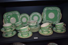 An early 20th century Crescent Rhapsody part tea service