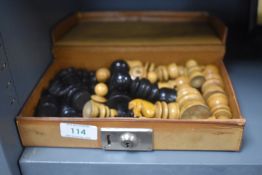 A fine part chess set in box wood and ebony some pieces being damaged and repaired.