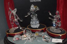 A modern Swarovski silver crystal glass figurine Masquerade set complete with stage, Pierrot,