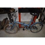 A vintage Triumph folding bike
