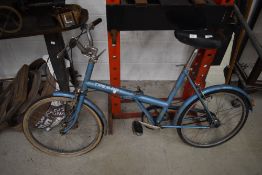 A vintage Triumph folding bike