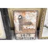 A vintage road junction sign