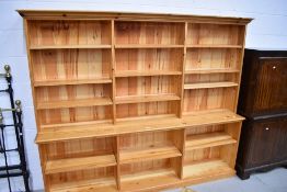 A modern pine triple bookshelf