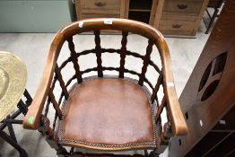 An early 20th Century lattice back arm chair