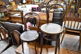 Two traditional bentwood chairs, tall and child's size