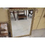 A modern gilt framed mirror