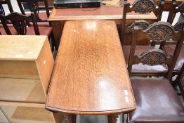 An early to mid 20th Century oak twist gateleg dining table