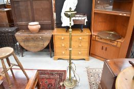 A late 19th or early 20th Century brass standard lamp