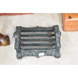 A cast iron boot scraper