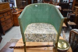 A woven fibre tub chair